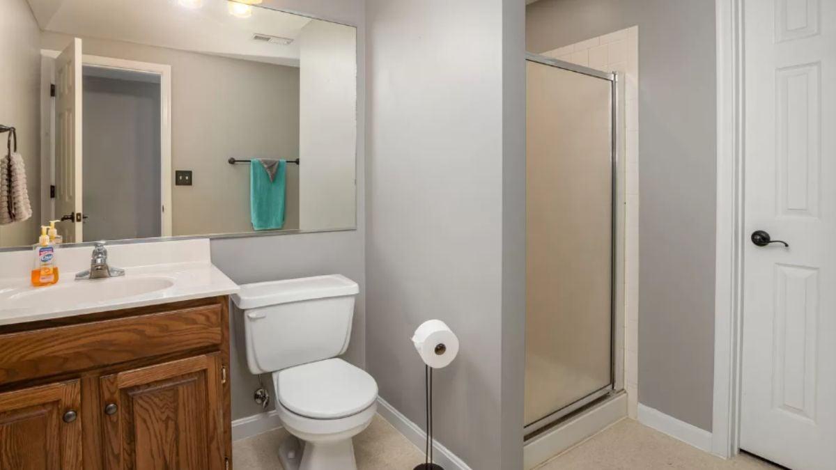 Functional Bathroom Featuring a Compact Shower Stall