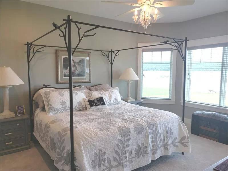 Look at the Artistic Canopy Frame in This Cozy Bedroom