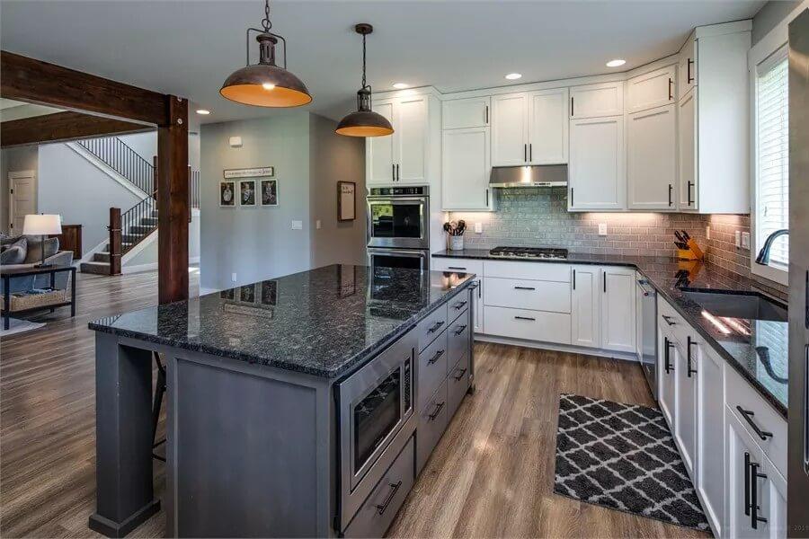 Modern Kitchen with Bold Black Island and Warm Industrial Touches