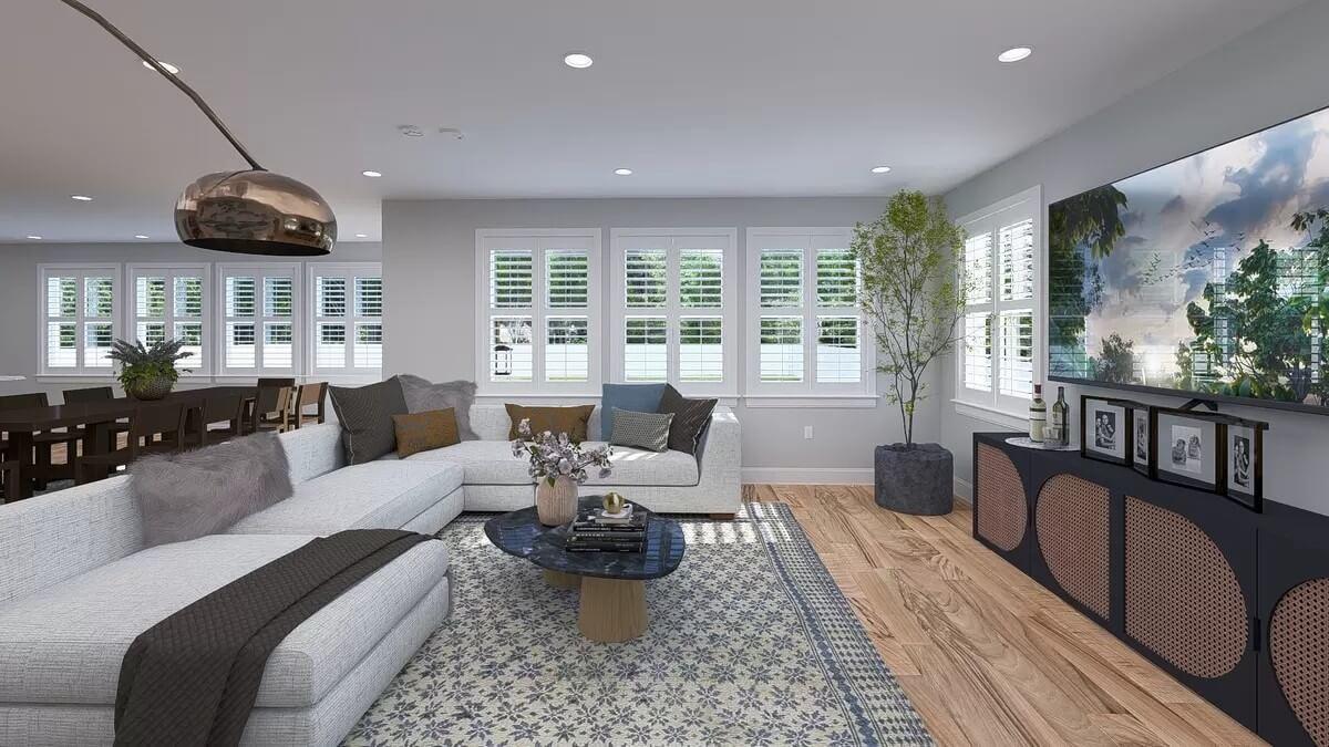 Take a Look at the Elegant Sectional and Sleek Entertainment Area