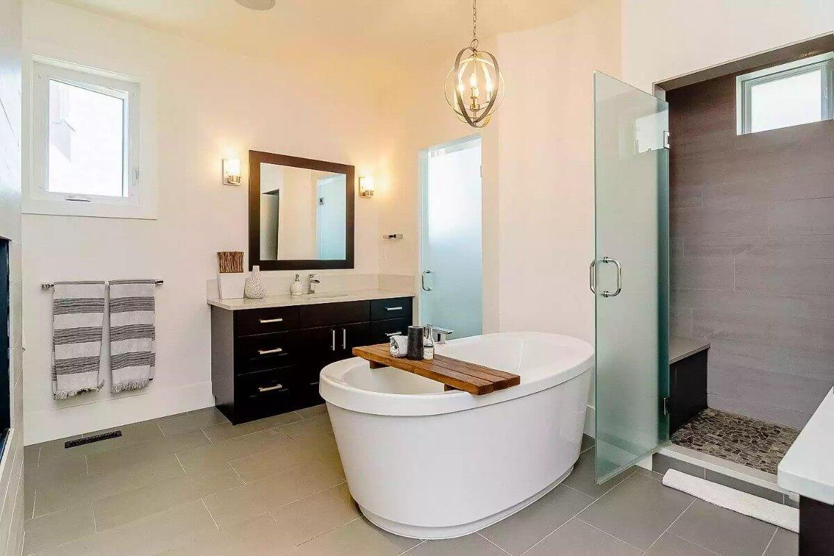 Freestanding Bathtub and Textured Tile: A Modern Sanctuary