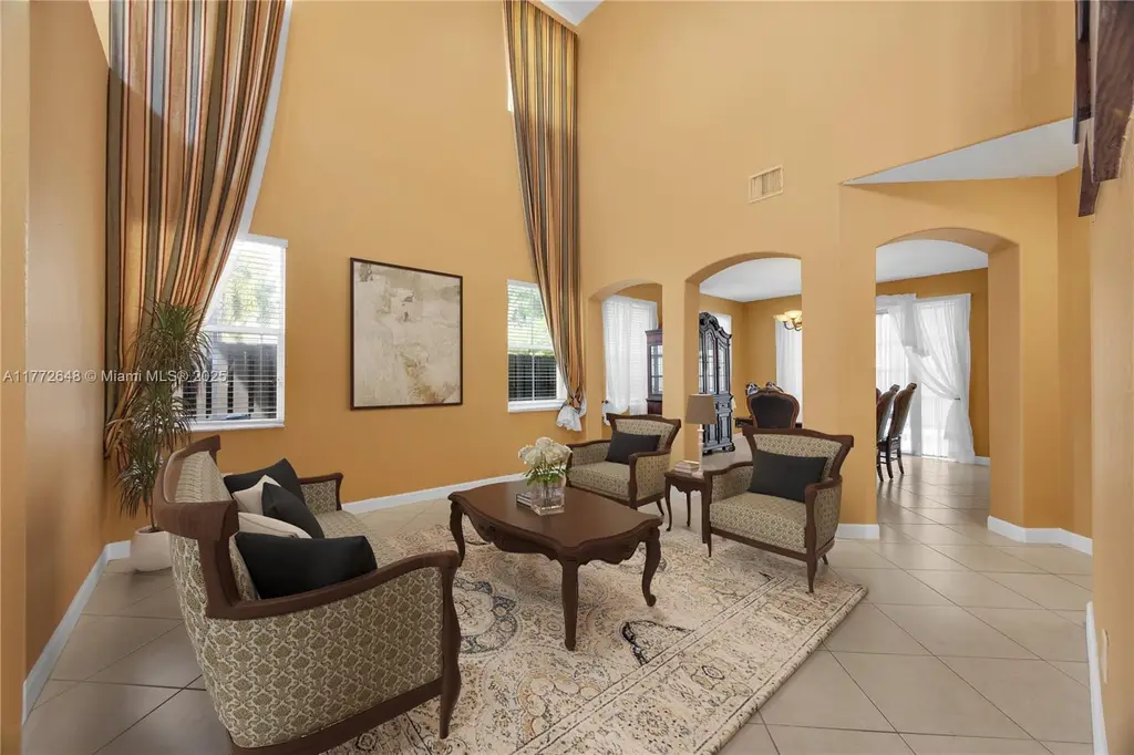 Mediterranean 4-Bedroom Revival-Style Home with Covered Patio and Two-Car Garage (2,747 Sq. Ft. Floor Plan)