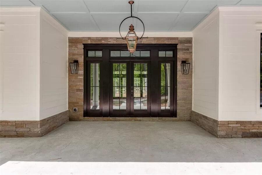 Elegant Front Entrance with a Distinctive Brick Frame