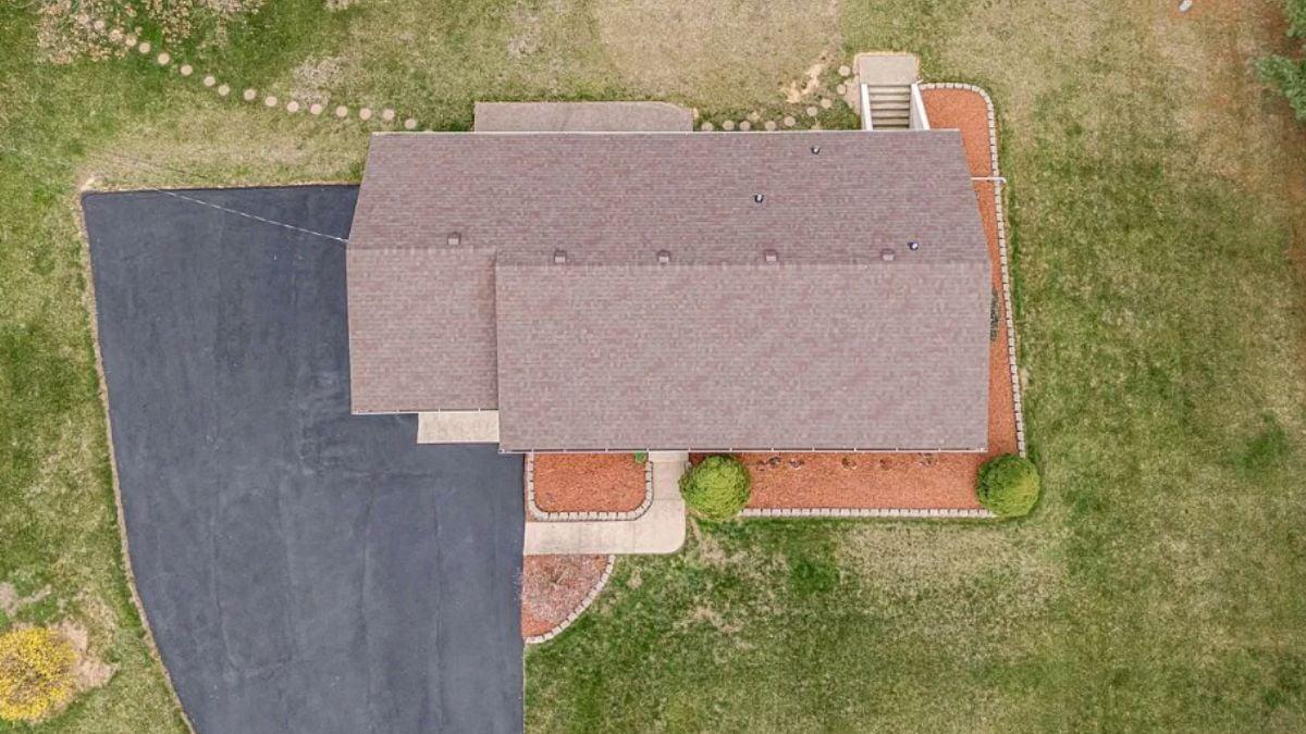 Aerial View Highlights Sleek Roofline and Smart Landscaping Choices