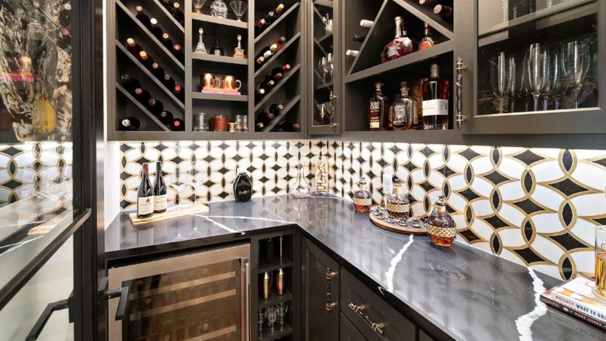 Check Out the Geometric Backsplash in This Sleek Wine Cellar
