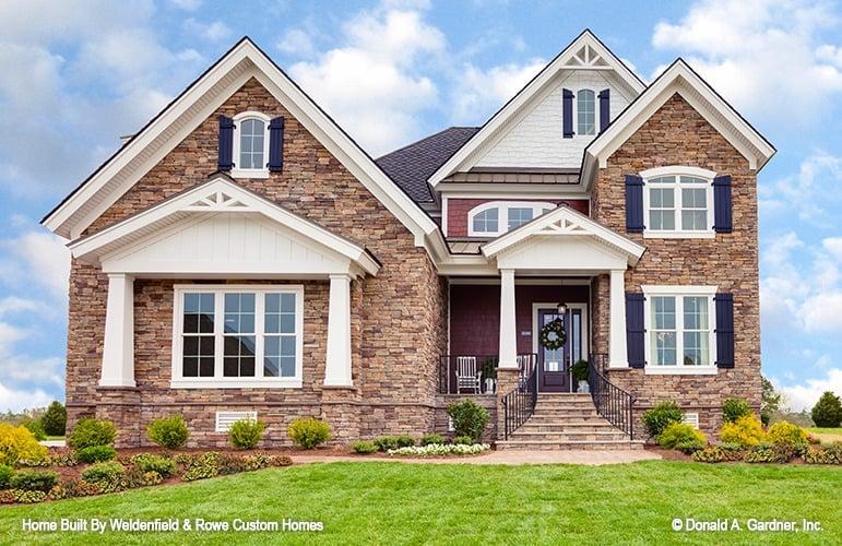 Wow, Check Out the Elegant Stone Facade on This Traditional Home