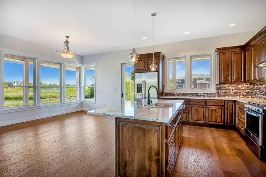 Notice the Large Windows Flooding This Craftsman Kitchen with Light