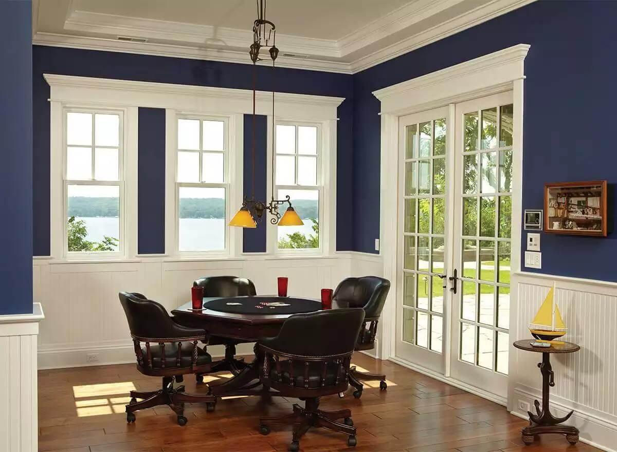 Check Out the Bold Blue Walls in This Lake-View Game Room