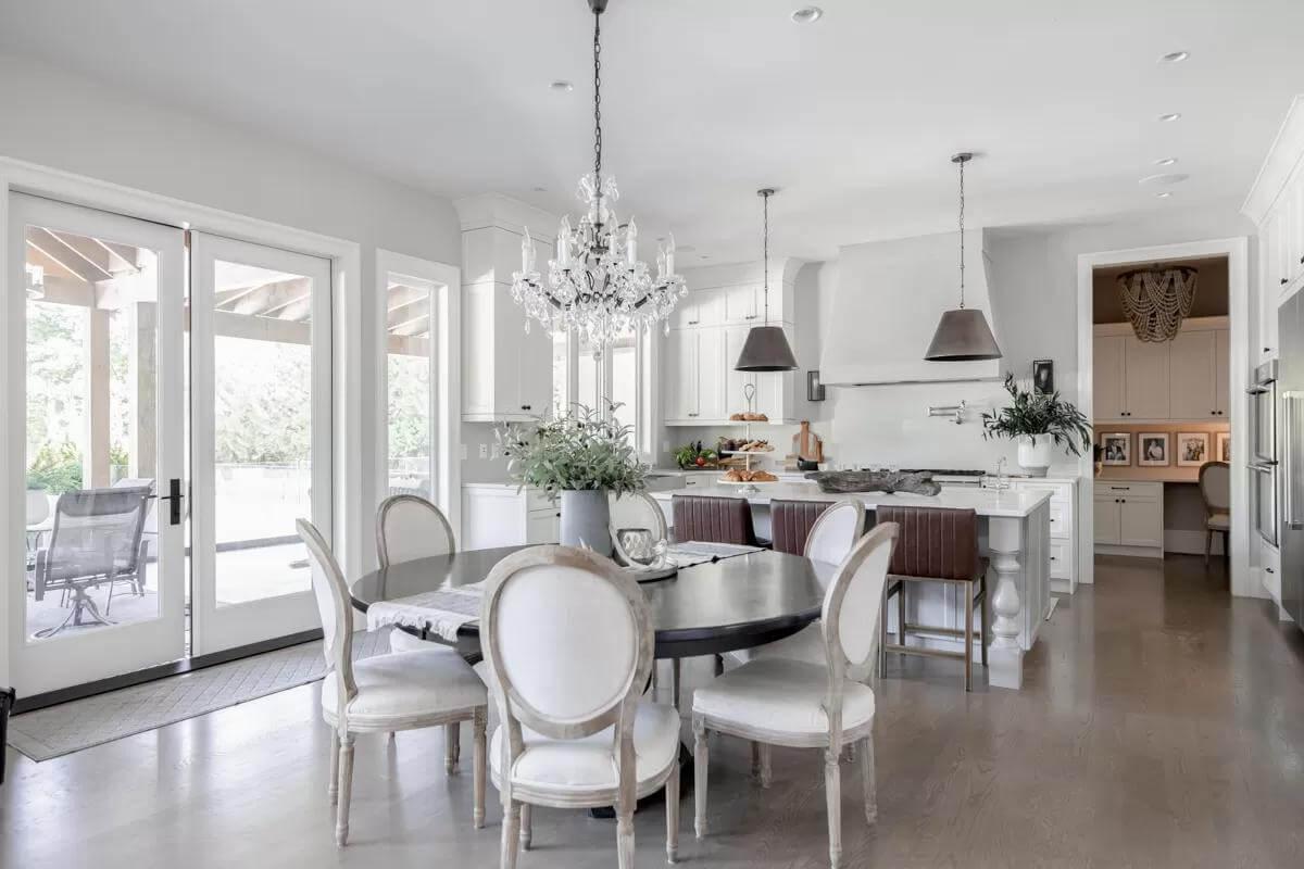 Chic Kitchen Dining Area with Elegant Chandelier Stealing the Show