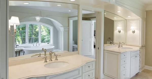 Elegant Bathroom Design Featuring Twin Vanities and a Luxurious Soaking Tub