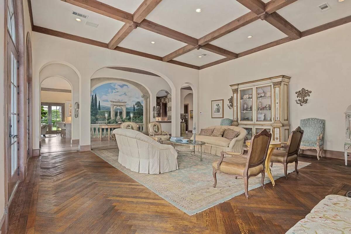 Admire the Intricate Ceiling Beams in This Elegant Living Room