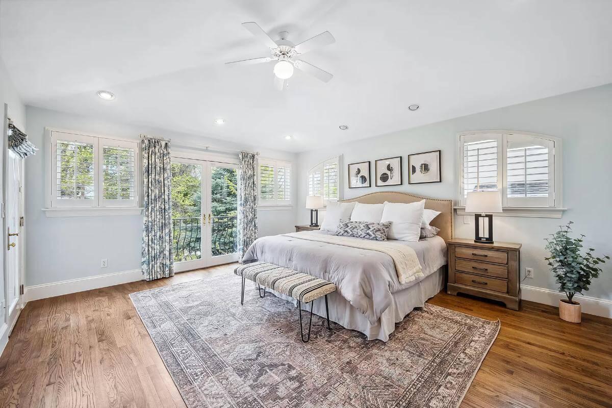 Relax in This Tranquil Bedroom with Expansive French Doors
