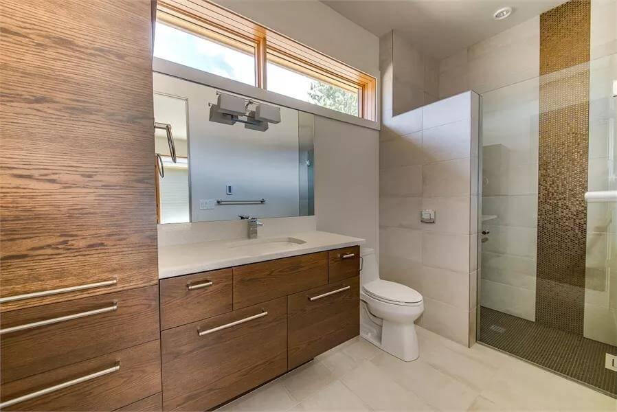 Explore This Sleek Bathroom Vanity with Warm Wood Tones