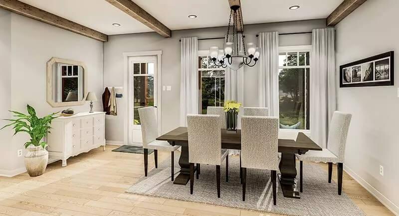 Elegant Dining Room with Exposed Beams and a Touch of Nature