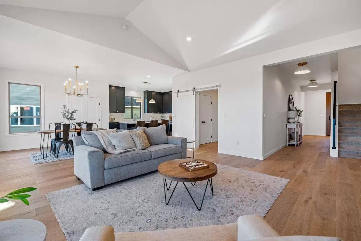 Spot the Barn Door Adding Character to This Open Living Area