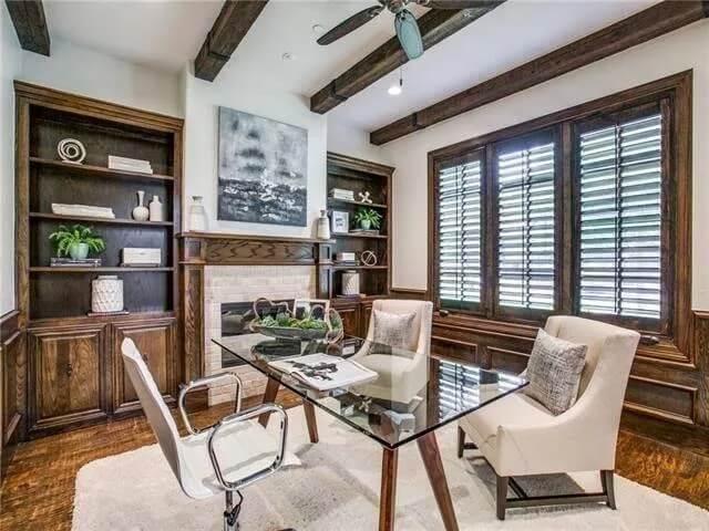 Home Office Elegance with Rich Wood Paneling and Beamed Ceiling