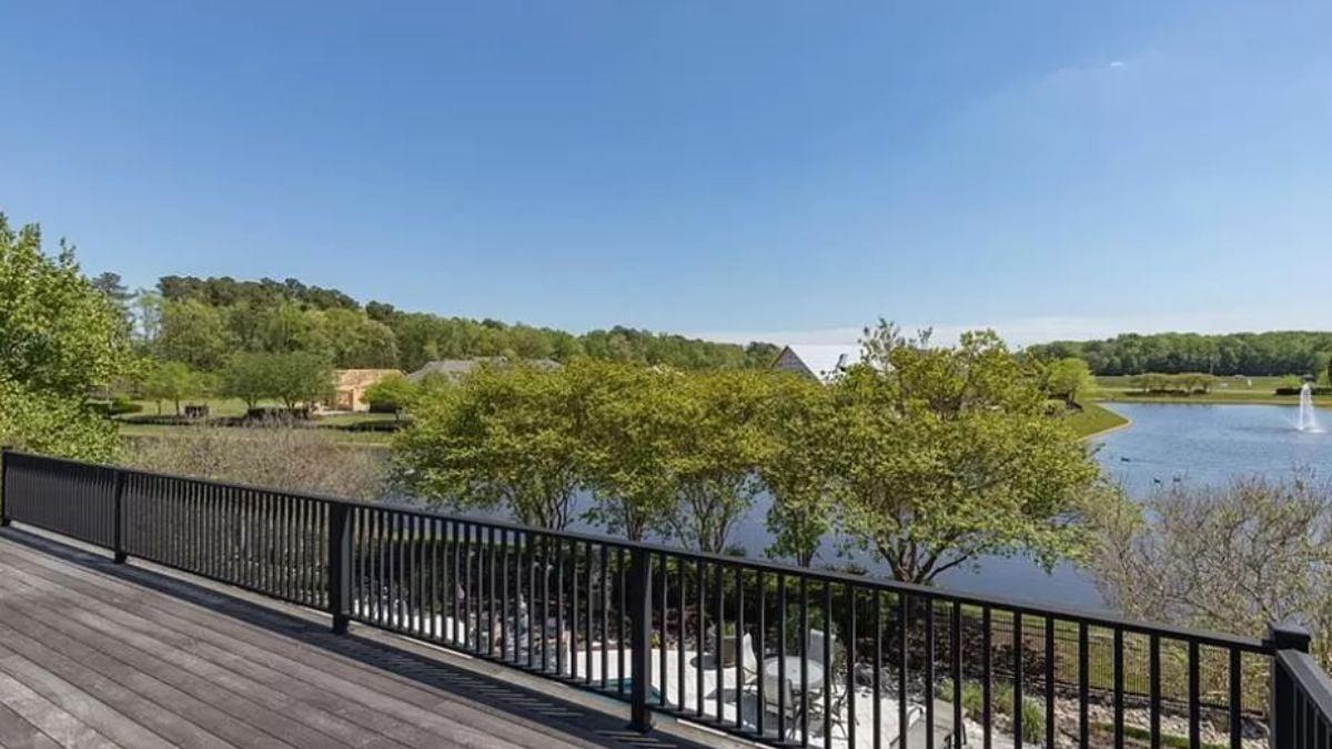Expansive Terrace with Scenic Water Views and Greenery All Around