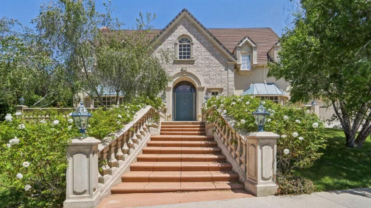 Notice the Majestic Stone Stairway Framed by Classic Balustrades