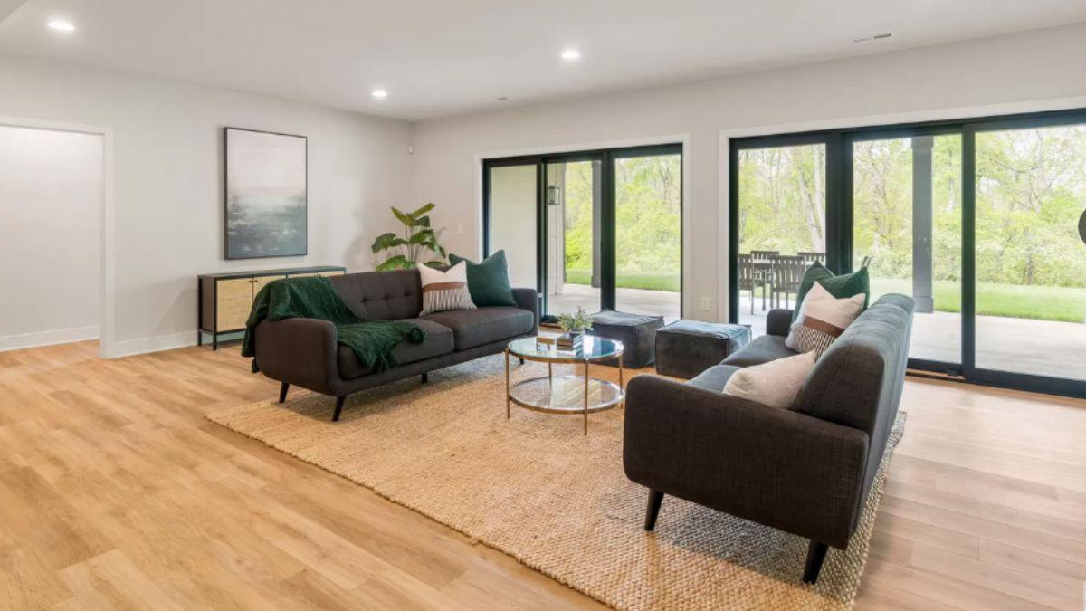 Check Out the Light-Flooded Living Room with Large Sliding Doors