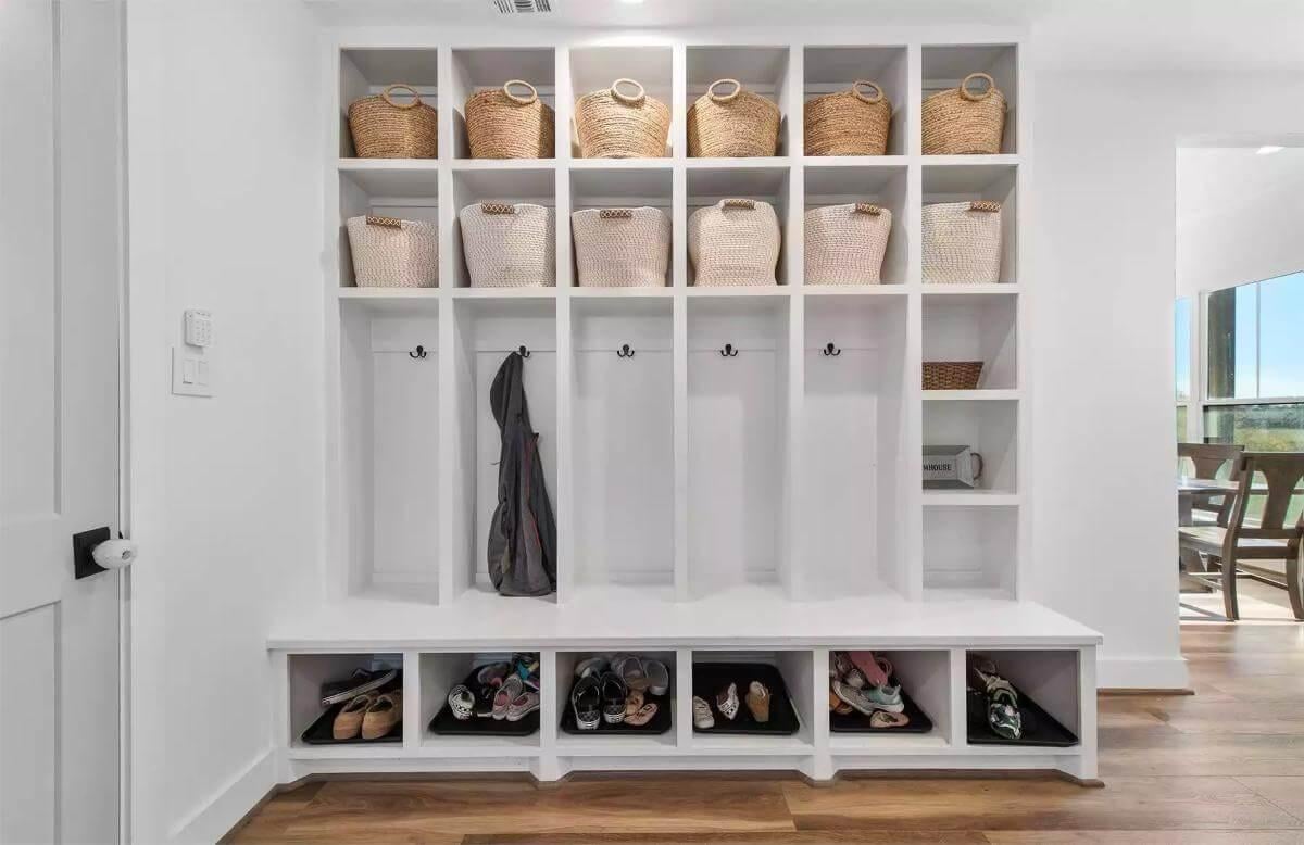 Look at These Organized Cubbies with Woven Baskets on Top