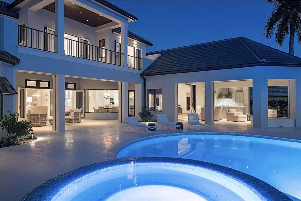 Evening Elegance by the Pool with Views into Chic Interior Spaces