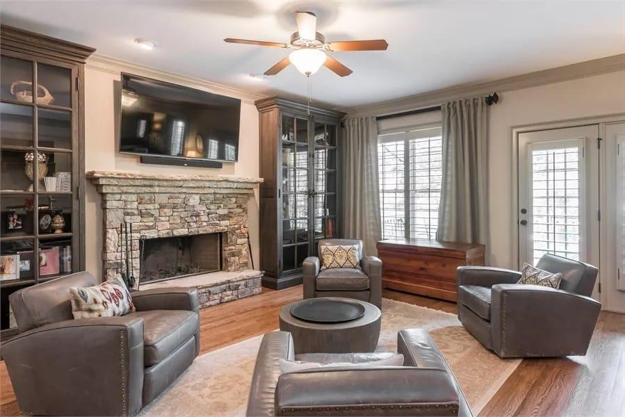 Striking Stone Fireplace Commands Attention in This Cozy Living Room