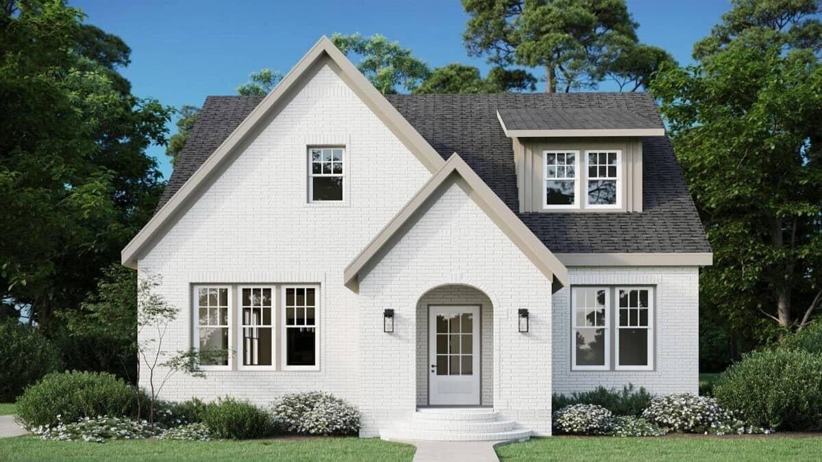 Classic White Brick Facade with Charming Arched Entryway
