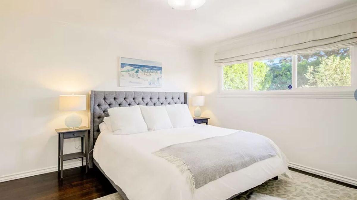 A Serene Bedroom with a Plush Tufted Headboard