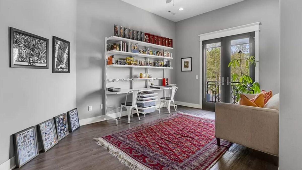 Explore This Bright Office with a Pop of Color From a Vibrant Rug