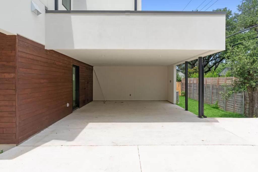 Check Out This Practical Carport with Wood Accents