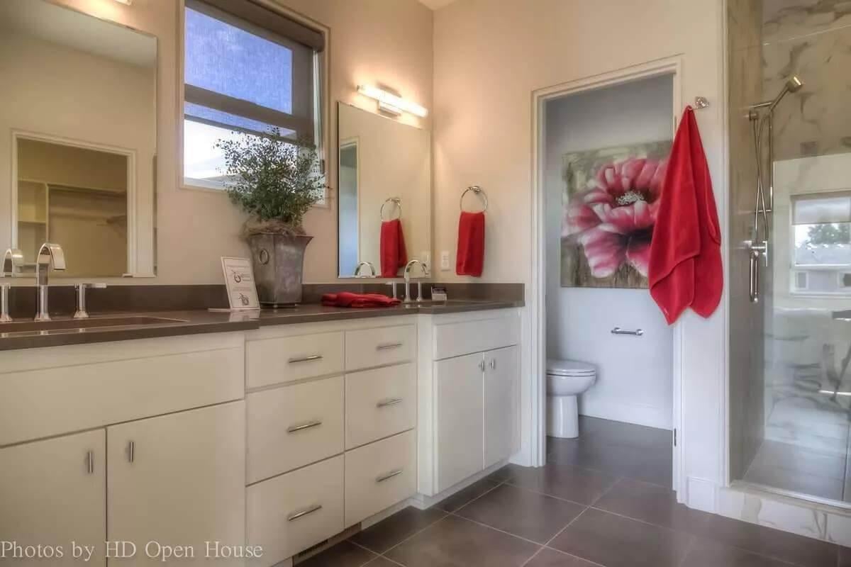 Stylish Bathroom with a Pop of Color and Functional Vanity