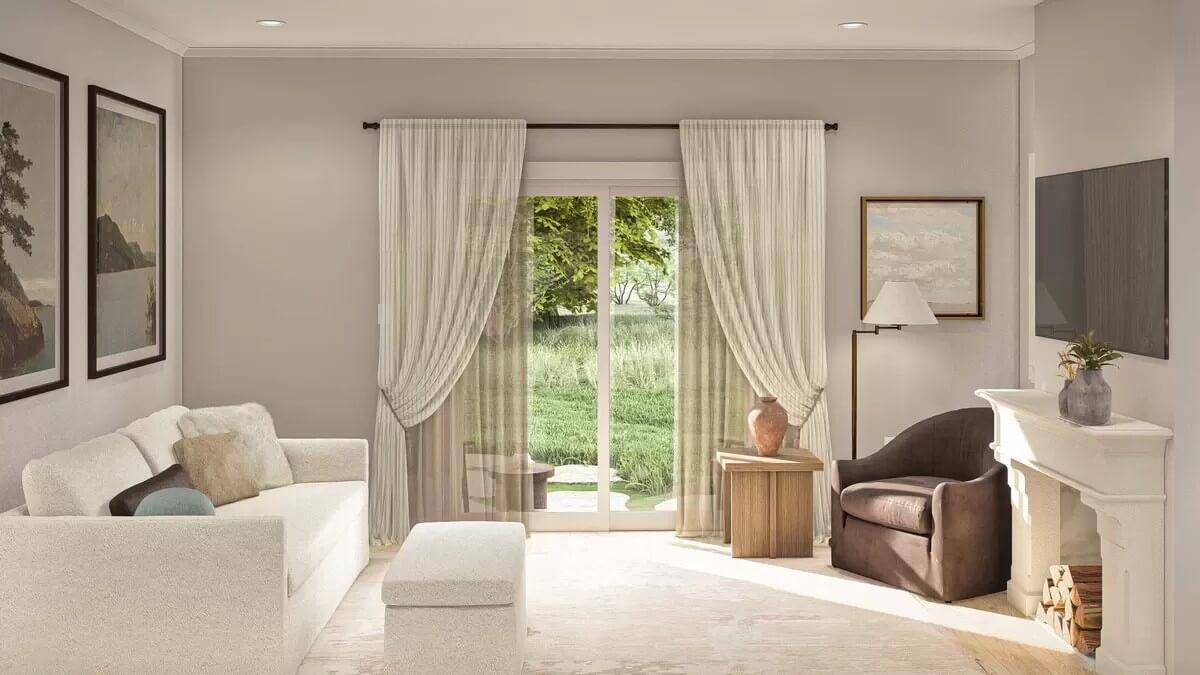 Check Out the Light-Filled Living Room with Sheer Curtains and a Classic Mantel