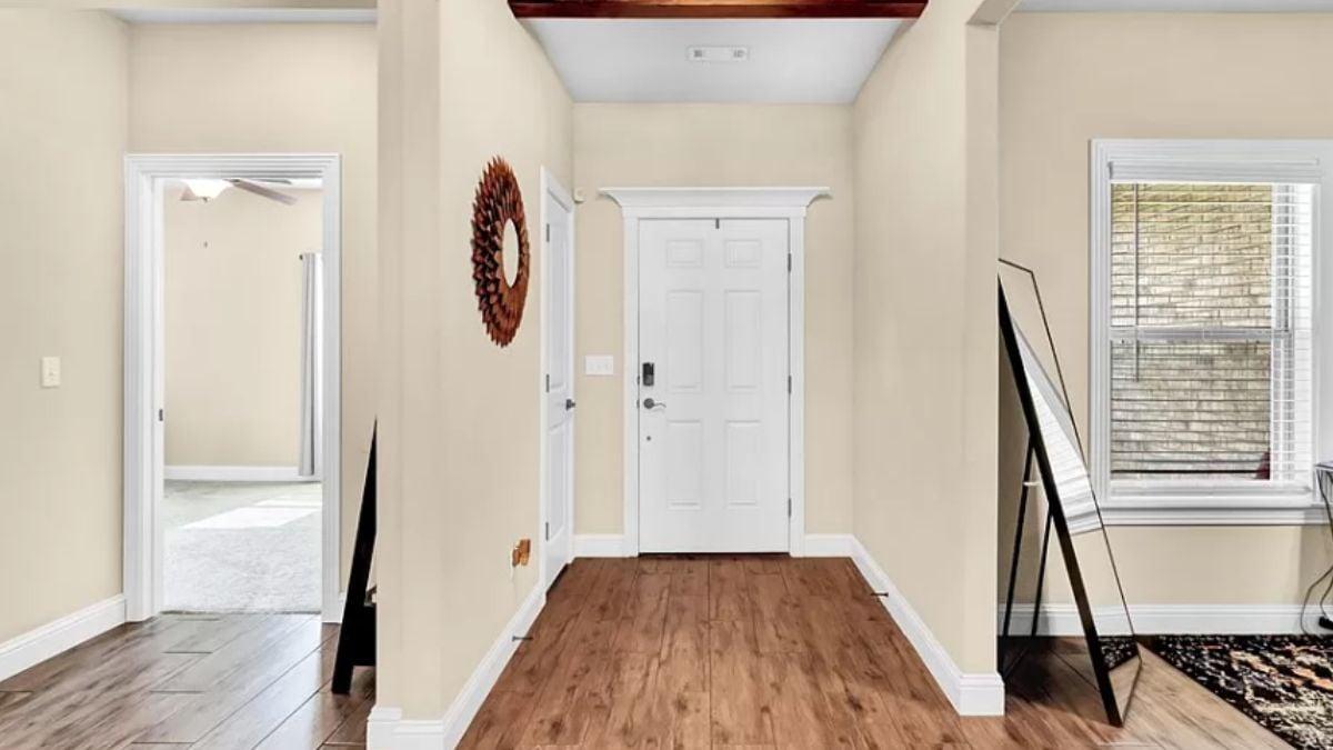 Simple Entryway with a Hint of Warmth from Wood Accents