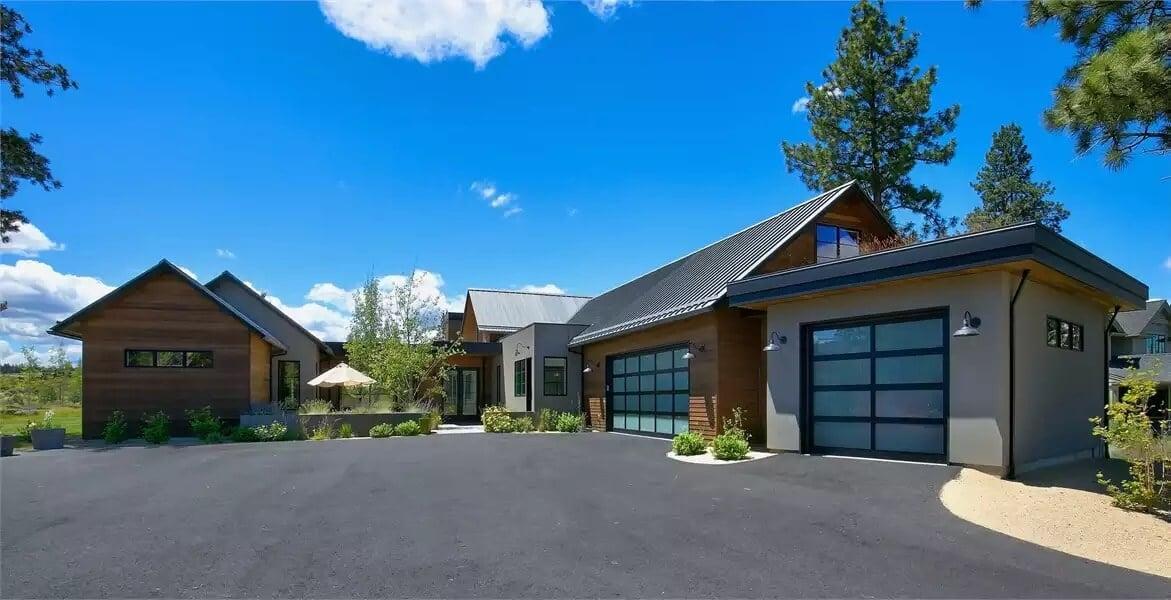 Modern Home with Striking Metal Roof and Sleek Garage Doors