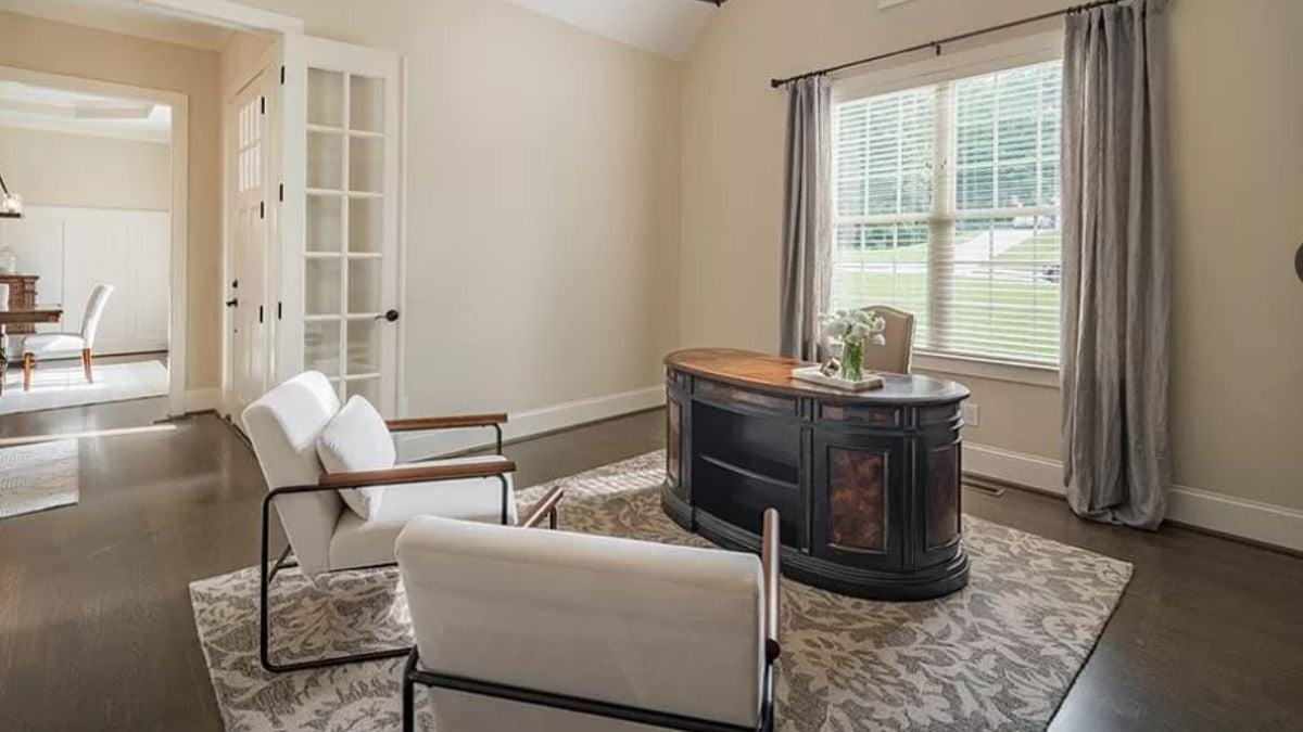 Charming Home Office with a Classic Dark Desk as a Focal Point
