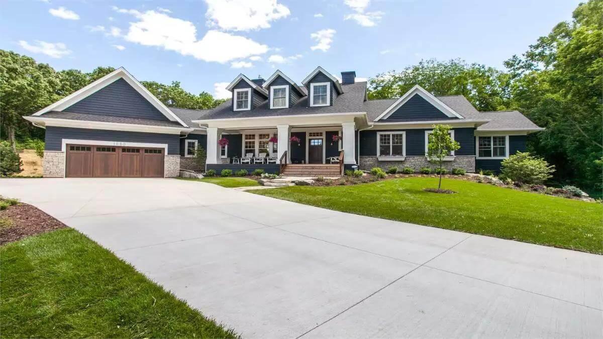Craftsman Charm with a Striking Gable Roof and Stone Accents