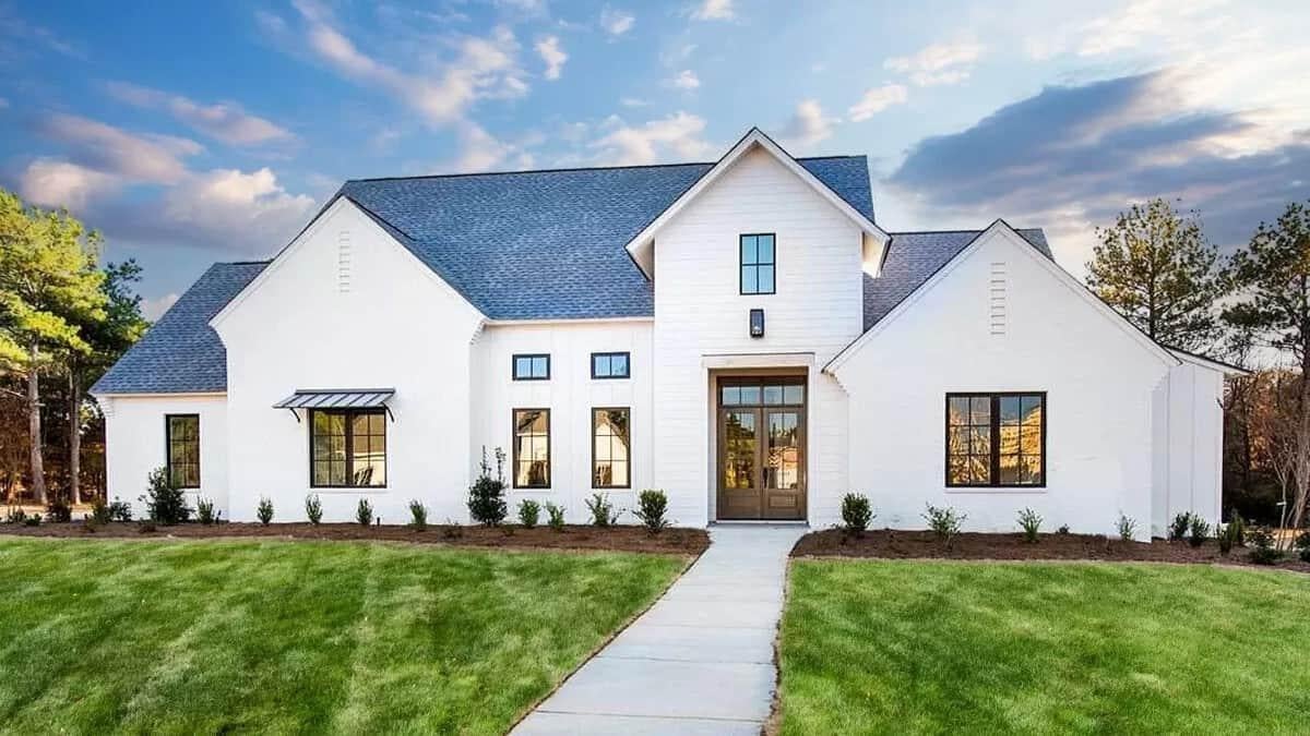 Classic White Exterior with Modern Touches and Symmetrical Design