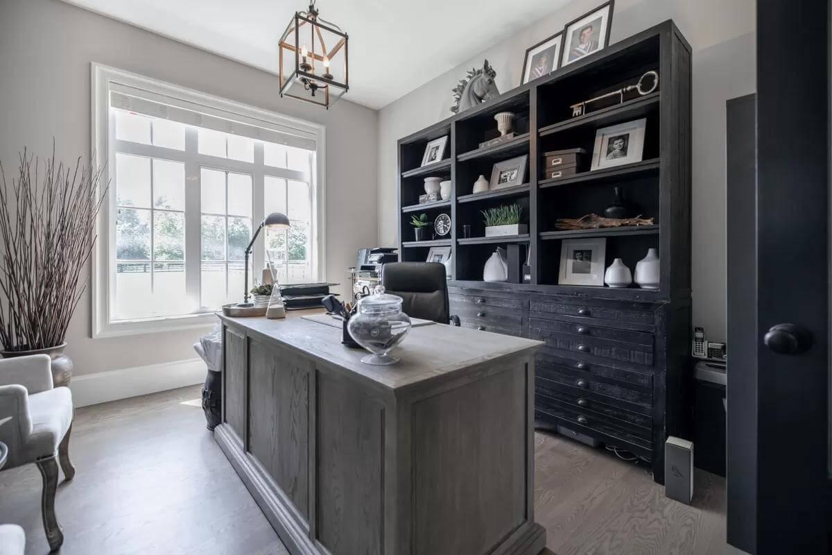 Home Office with Stunning Light Fixture You