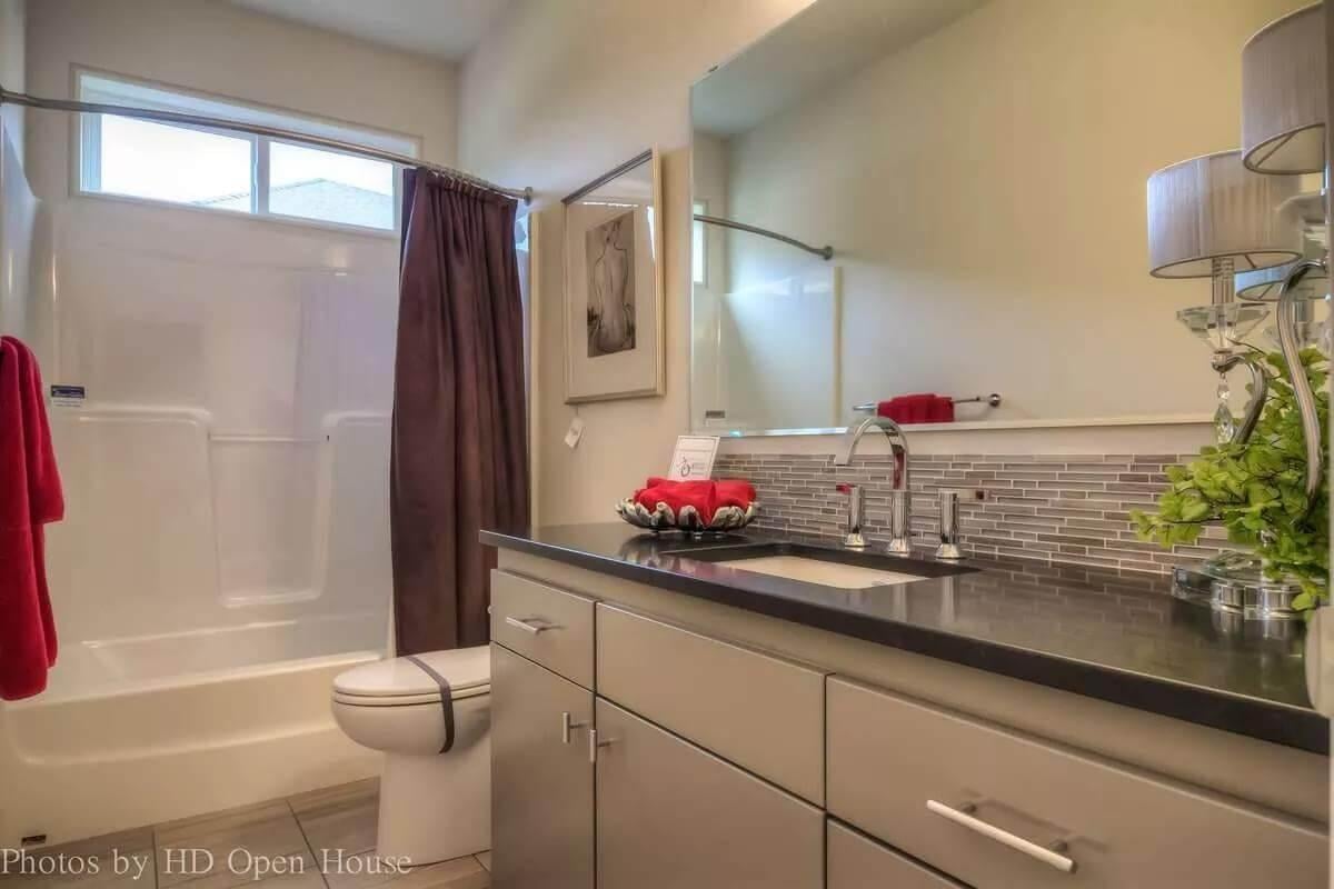 Modern Bathroom Featuring Chic Tile Backsplash