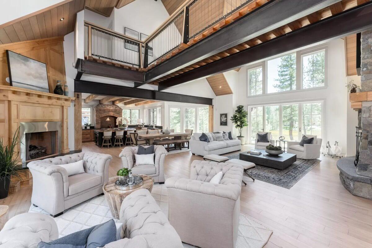 Exploring Open Spaces: Lofted Views and Ample Windows in This Living Area