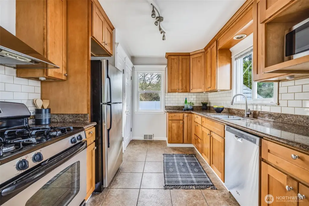 Cape Cod Style 5-Bedroom Home with Open-Concept Layout and Lower Level ADU (2,400 Sq. Ft. Floor Plan)