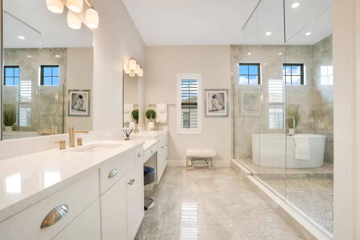 Notice the Spacious Walk-In Shower and Freestanding Tub in This Luxurious Bath