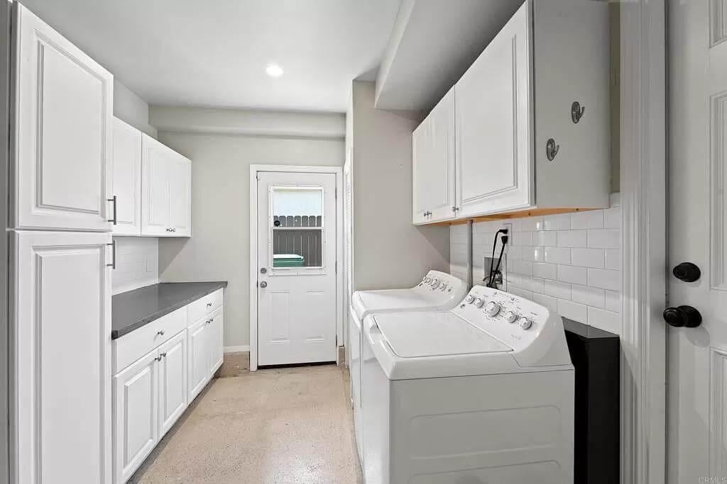 Spot the Subway Tile Backsplash in This Crisp Laundry Room