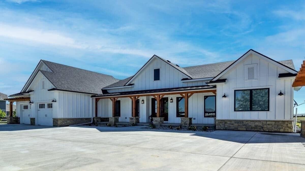 Classic Farmhouse Exterior with Striking Wooden Accents