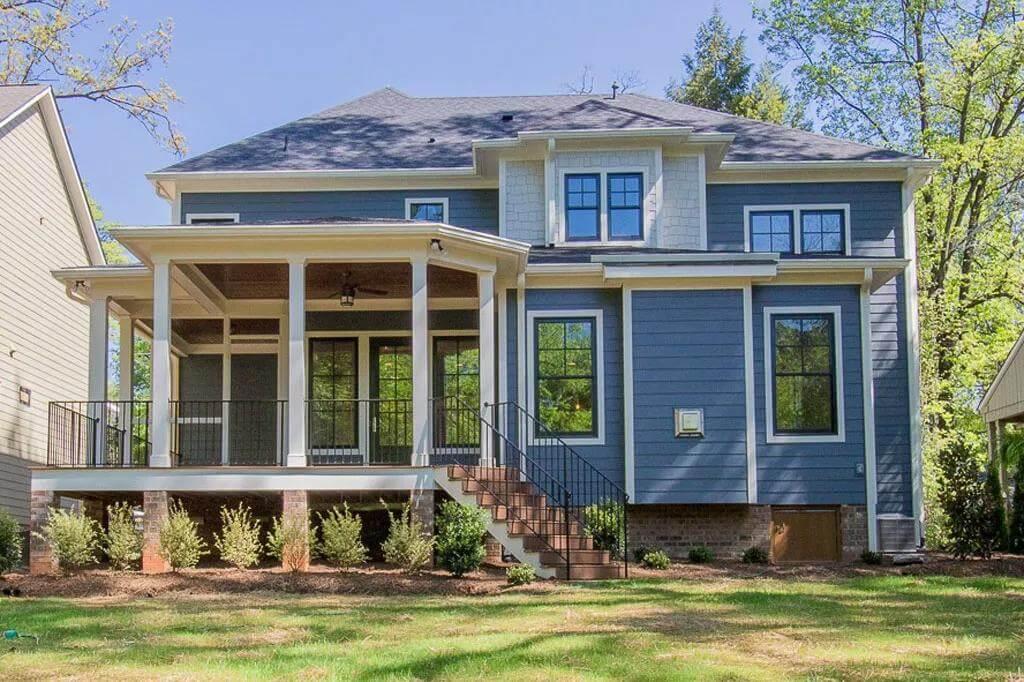 Gorgeous Craftsman Rear View Featuring a Spacious Covered Porch