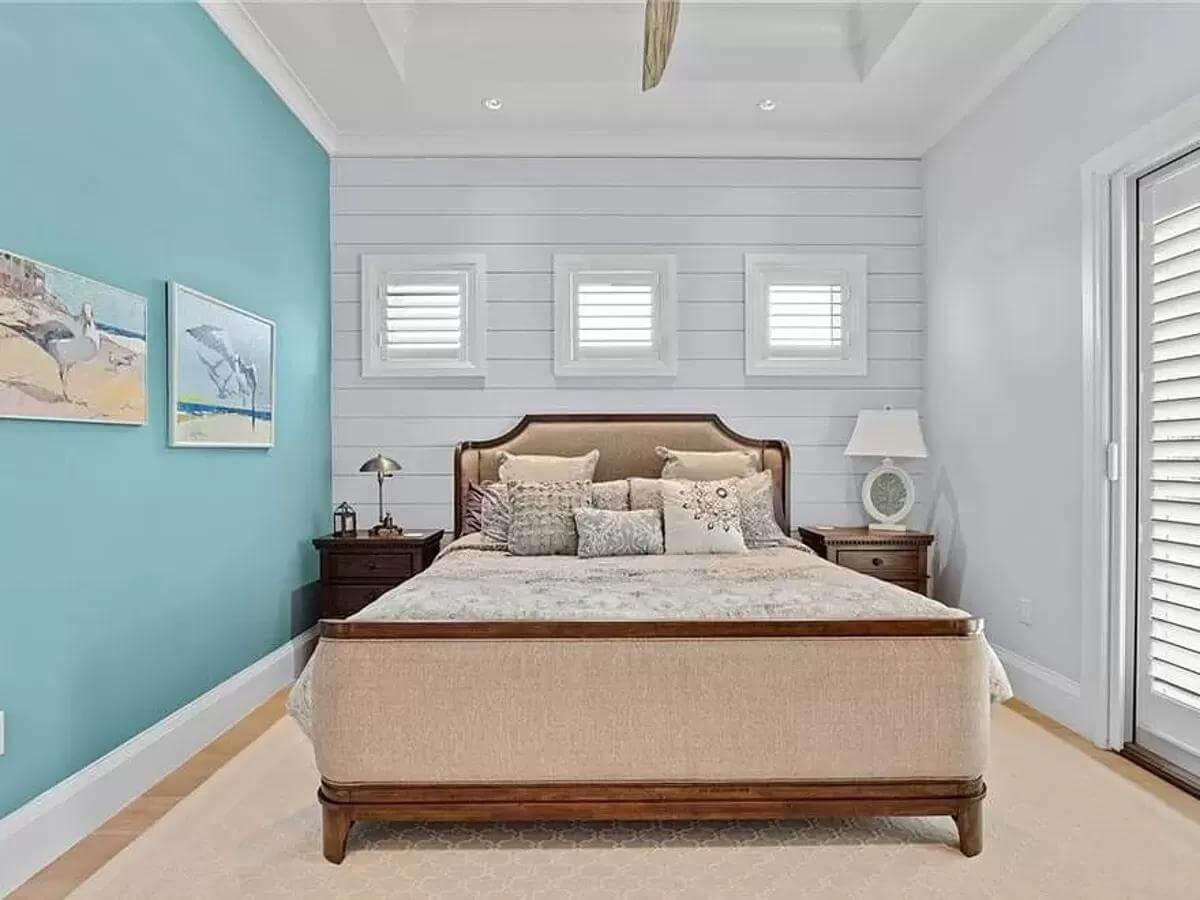 Notice the Shiplap and Serene Beachy Vibes in This Bedroom