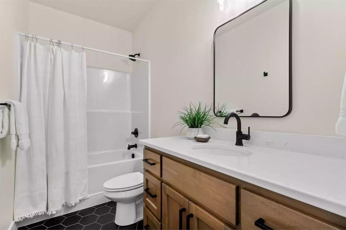 Check Out the Matte Black Fixtures in This Craftsman Bathroom