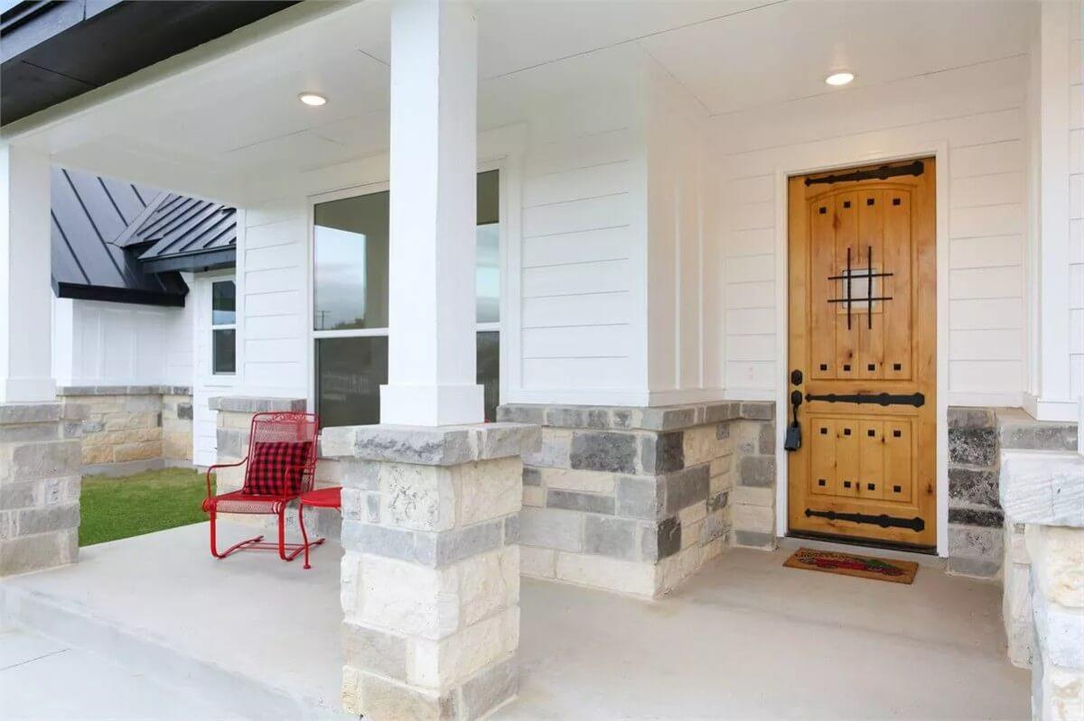 Charming Farmhouse Entrance with a Touch of Rustic Style