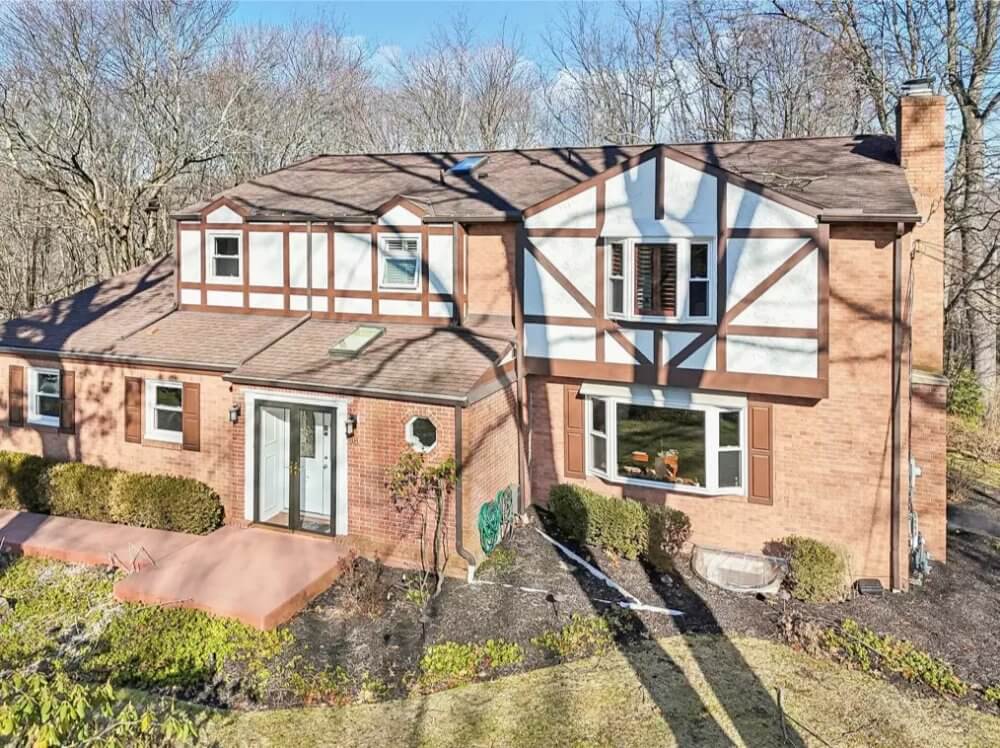 Tudor-Style 5-Bedroom Home with Bonus Room and Open-Concept Living (6,336 Sq. Ft. Floor Plan)
