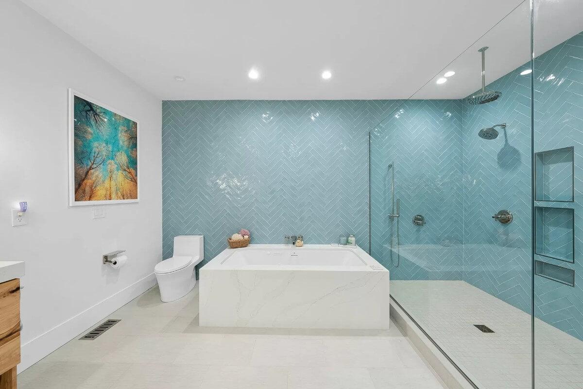 Stylish Bathroom Featuring a Bold Blue Herringbone Wall